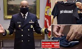 Surgeon General makes face mask with T-shirt and rubber bands ...